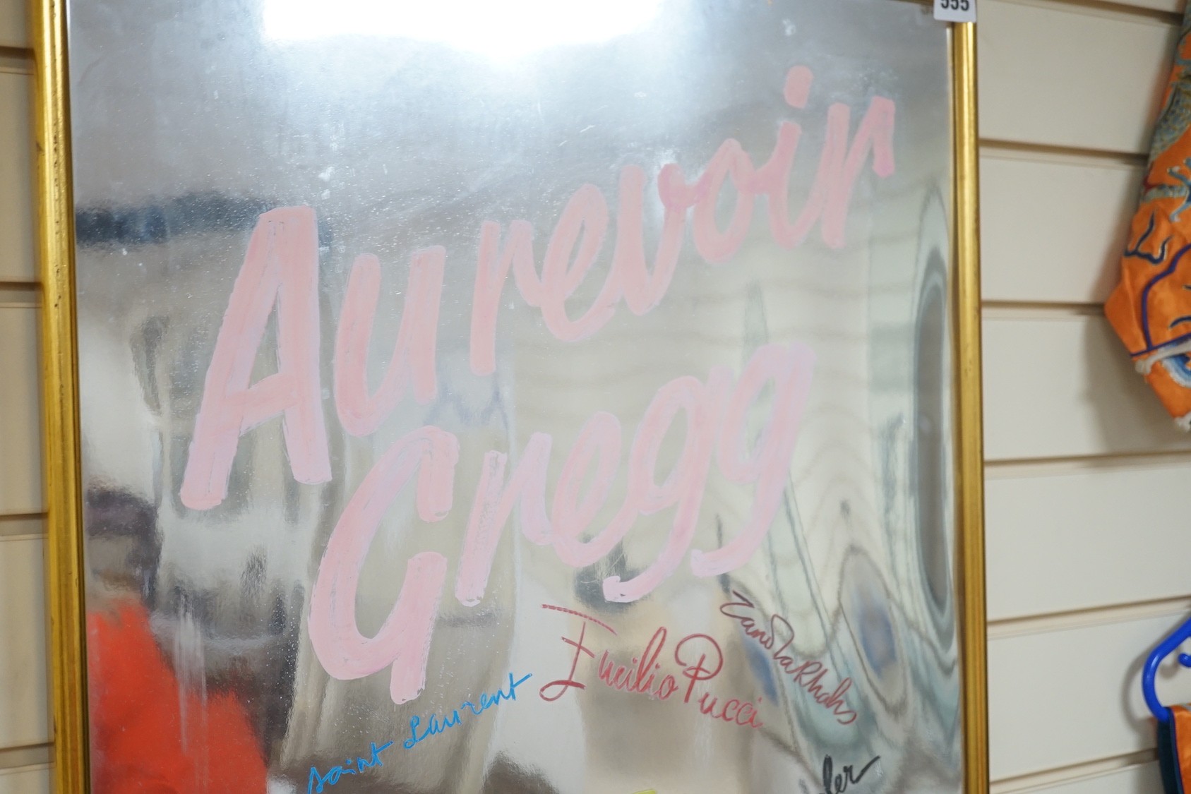 A presentation mirror ‘Aurevoir Gregg’, bearing signatures - 78 x 53cm